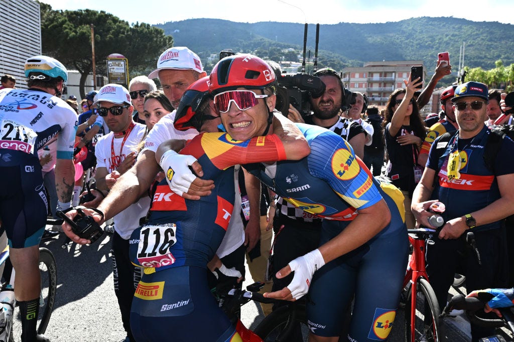 ANDORA ITALY  MAY 07 LR Juan Pedro Lopez of Spain and stage winner Jonathan Milan of Italy and Team Lidl  Trek react after the 107th Giro dItalia 2024 Stage 4 a 190km stage from Acqui Terme to Andora  UCIWT  on May 07 2024 in Andora Italy Photo by Fabio Ferrari  PoolGetty Images