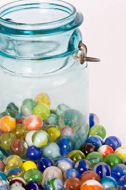 Marbles And A Jar Stock Photo - Download Image Now - Jar, Marbles, Glass -  Material - iStock