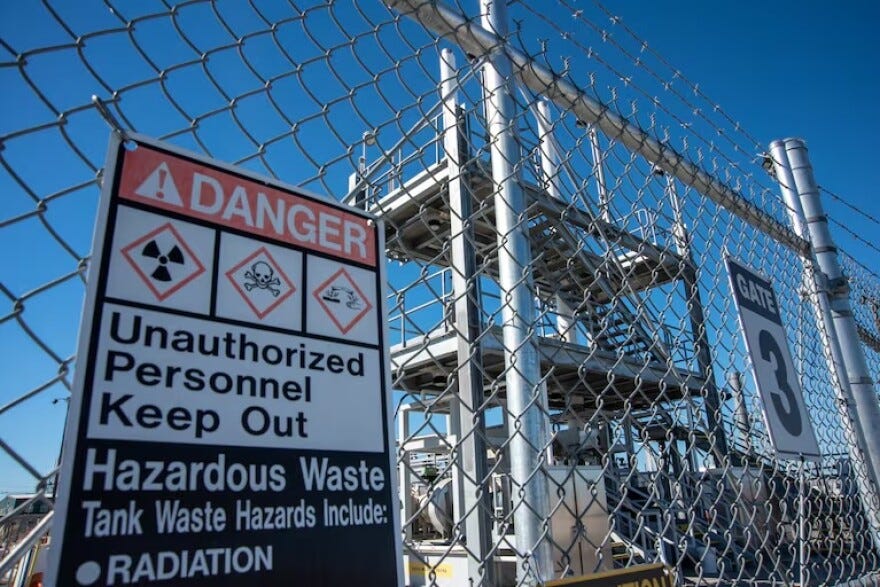 Caution signs warn of radioactive materials at the Tank-Side Cesium Removal System process enclosure outside AP Tank Farm on the Hanford Nuclear Reservation, Sept. 24, 2024. Amazon announced in October that it plans to build nuclear reactors in southeast Washington that would power its data centers in Umatilla and Morrow counties, but many tribes and environmentalists are against it.