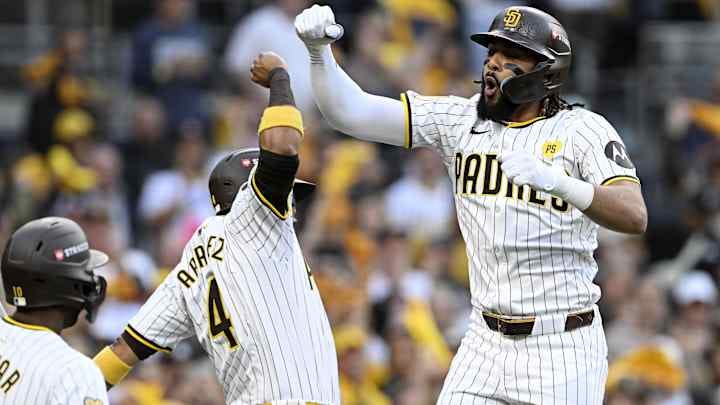San Diego Padres outfielder Fernando Tatis Jr. (right) reacts after hitting a two run home run against the Atlanta Braves on Tuesday at Petco Park.