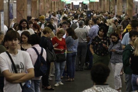 People take shelter in a station during an air alert on Monday.