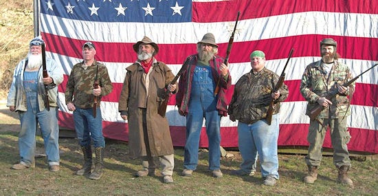 A photo of the Mountain Monsters cast, six men who do not look like they star in a TV show at all