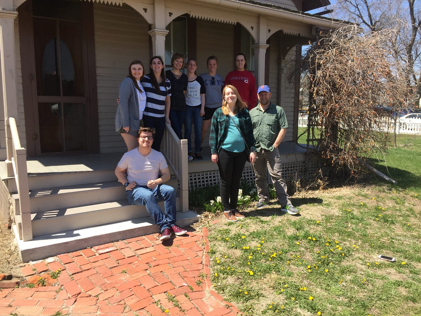 students and a professor outside Cather's childhood home in Red Cloud, Nebraska