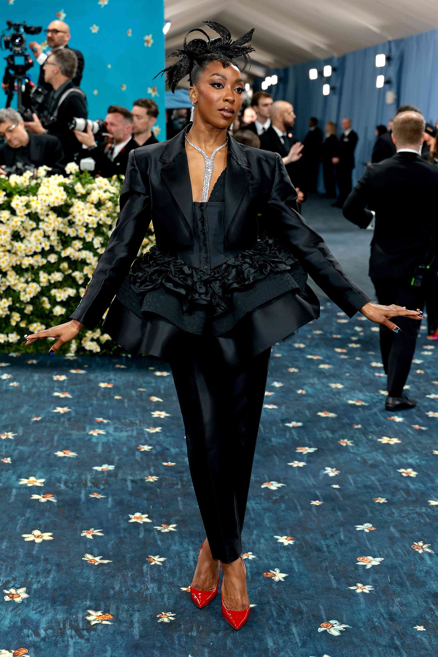 Ego Nwodim Wears Ruffled Peplum Suit with Rainbow Buttons to 2025 Met Gala