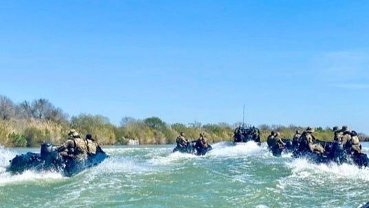 Texas Military Forces and State Police tactical drill on the Rio Grande before seizing control of Fronton Island aka "Cartel Island." Texas Military Forces and State Police tactical drill on the Rio Grande before seizing control of Fronton Island aka "Cartel Island."