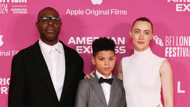 Steve McQueen, Elliott Heffernan and Saoirse Ronan attend the 2024 BFI London Film Festival Opening Night World Premiere of Apple Original Films’ “Blitz” at the Royal Festival Hall. “Blitz” will debut in select theaters November 1, 2024 before premiering globally on Apple TV+ November 22, 2024.