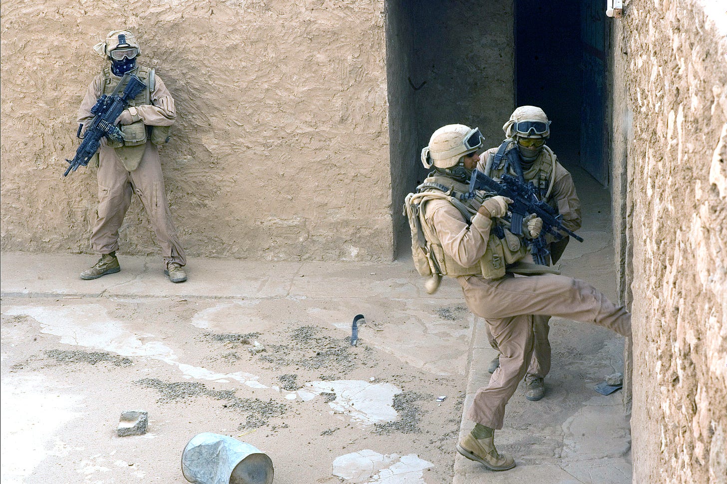 U.S. Marines clear an abandoned building during Operation Defeat Al Qaida  in northern Al Anbar province,