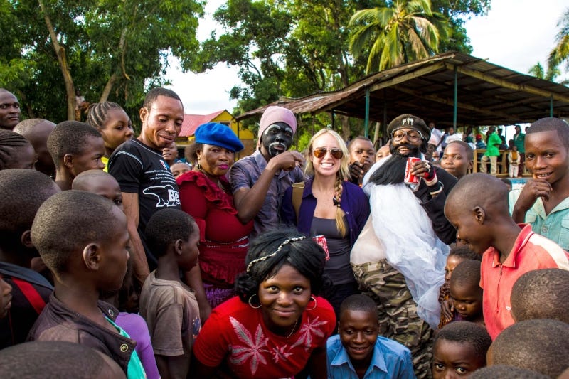 “The distributors and local children pose for a photo after a successful distribution and hanging of the nets.” Photo and caption courtesy of AMF