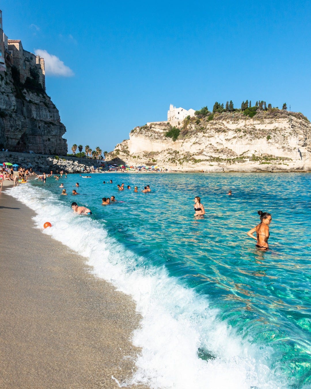 May be an image of 7 people and beach