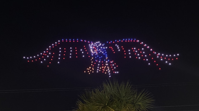 GALLERY: Surprise drone light show illuminates skies over CCMF with  patriotic displays | WPDE