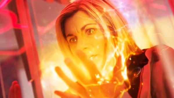 This image shows the Thirteenth Doctor (played by Jodie Whittaker) looking distressed as glowing amber energy begins streaming from her hands, signaling the start of a forced regeneration (courtesy of the Master) in Doctor Who Series 13's ninth episode, "The Power of the Doctor." This image shows the Thirteenth Doctor (played by Jodie Whittaker) looking distressed as glowing amber energy begins streaming from her hands, signaling the start of a forced regeneration (courtesy of the Master) in Doctor Who Series 13's ninth episode, "The Power of the Doctor."