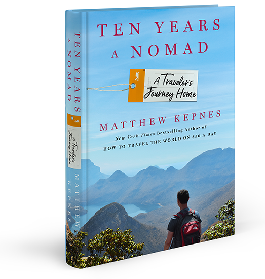 cover of Ten Years a Nomad, by Matthew Kepnes, featuring a man wearing a backpack, facing away from the camera toward mountains and lakes