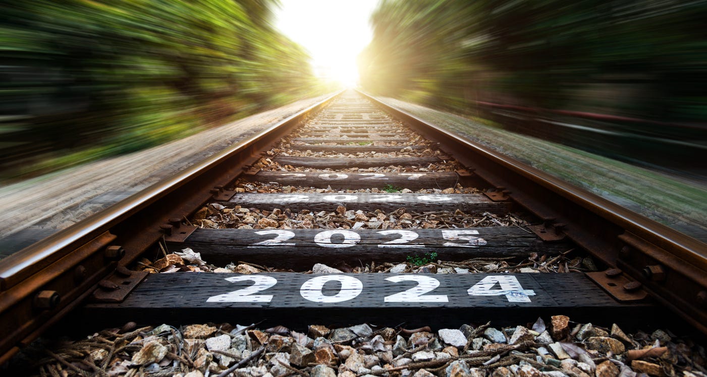 Rail tracks with 2024 - 2027 printed on them