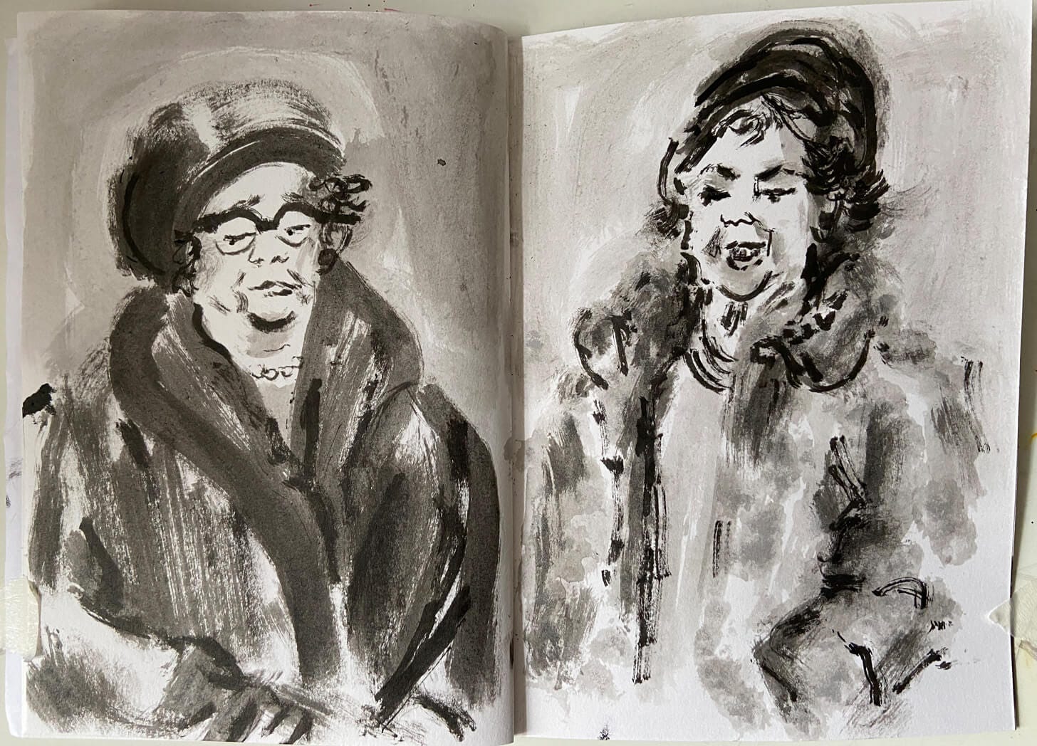 Sketchbook of textured, expressive drawings of two older women in large formal coats and hats. The drawings are made from film footage using ink. Drawings by Nanette Regan