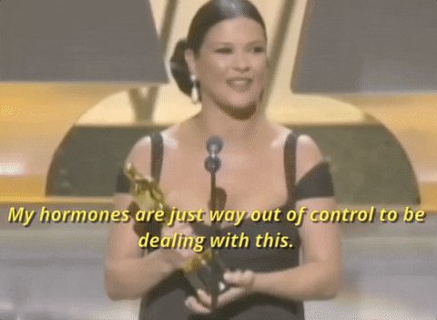 GIF of Catherine Zeta-Jones winning an Oscar saying 'my hormones are just way to out of control to deal with this'