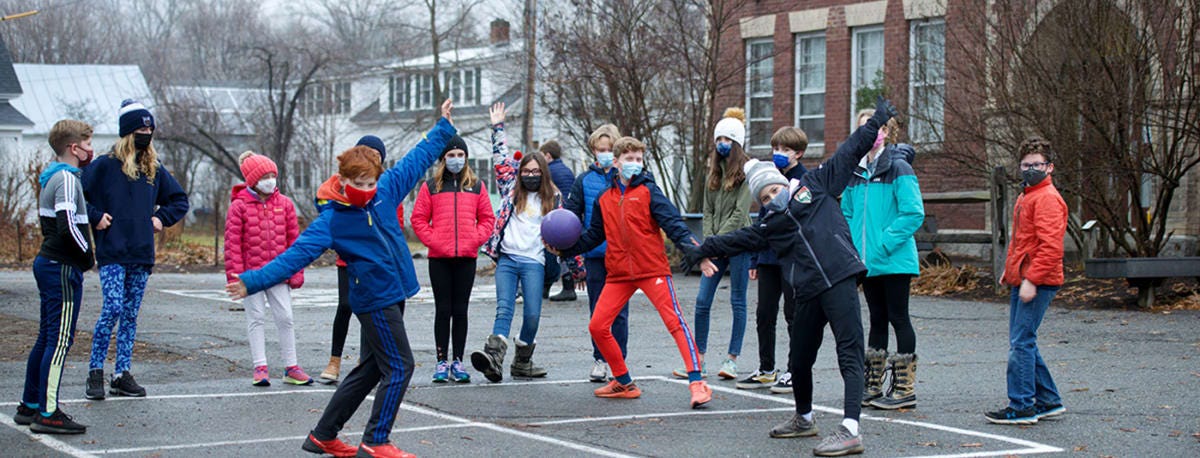 MCS Students Outside standing around on the tar