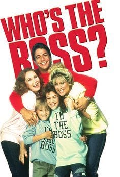 Image of five white people-and older woman, a middle-aged man and woman, a boy child, and a girl teenager against white background and red letters "Who's the boss?"