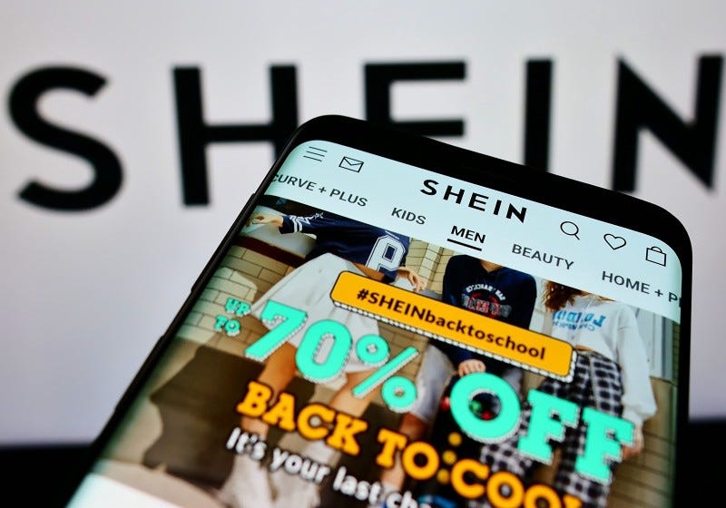 A mobile phone has the fast clothing retailer SHEIN’s website up with the promotion “up to 70% off Back to Cool”.