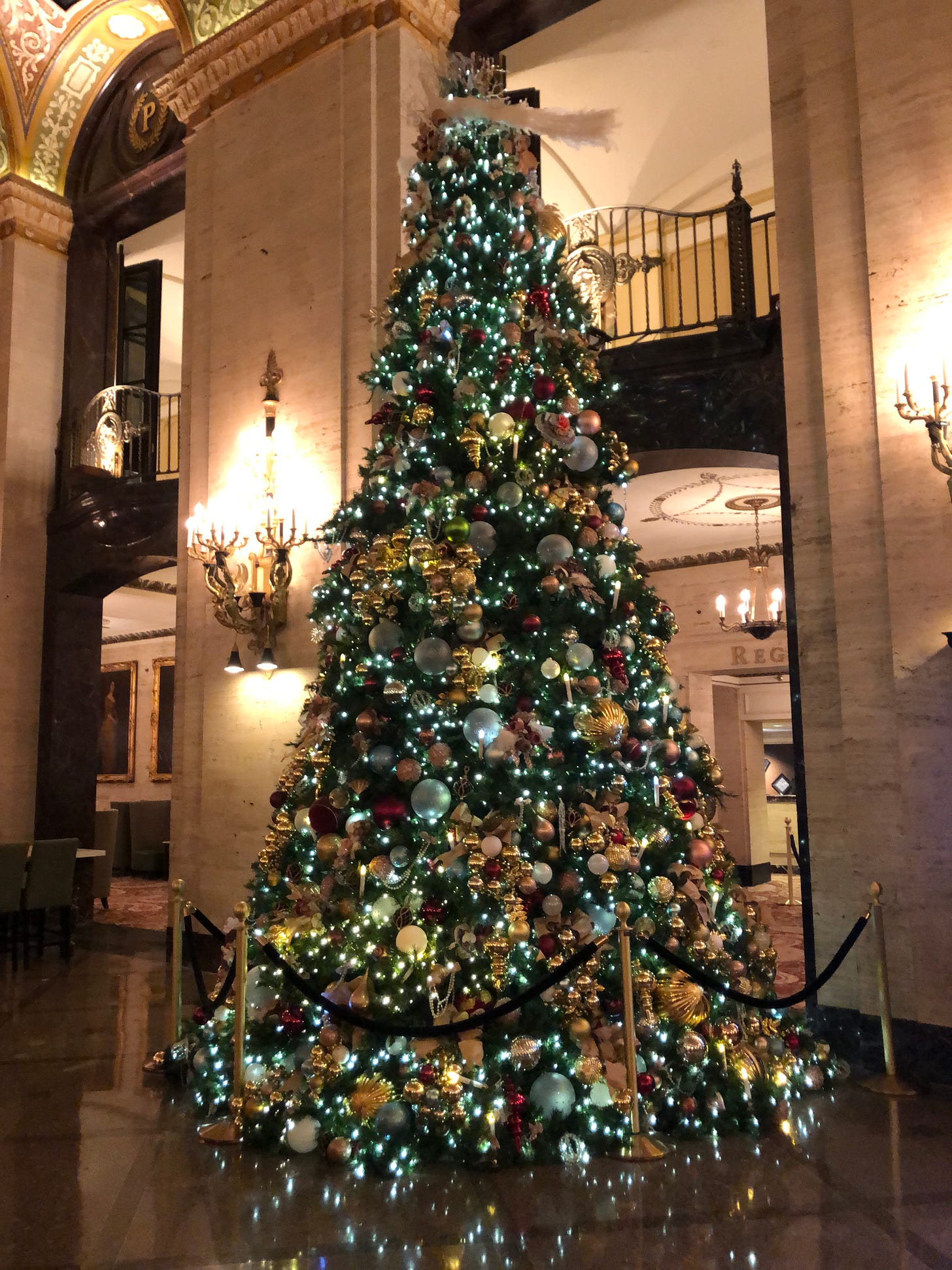 Photo of gorgeously decorated and tall Christmas tree in the lobby of the Palmer House hotel in Chicago