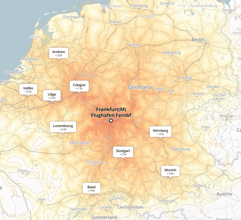 A map showing an isochrone visualization of rail travel times to and from Frankfurt Airport (Frankfurt(M) Flughafen Fernbf). The map is color-coded to represent different travel time ranges, with lighter colors indicating longer travel times. Major nearby cities are labeled with estimated rail travel times: Cologne (<1 hour), Stuttgart (<2 hours), Liège (<2 hours), Nürnberg (<3 hours), Arnhem (<3 hours), Ixelles (<3 hours), Munich (<4 hours), Luxembourg (<4 hours), and Basel (<4 hours). The map highlights the extensive rail connectivity of Frankfurt Airport across Germany and neighboring countries.