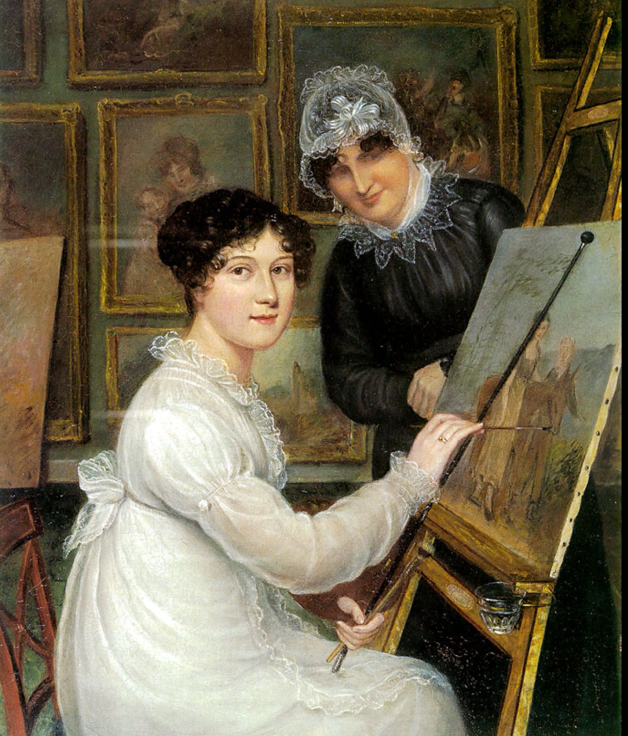 Self-portrait of a 19th century artist, Rolinda Sharples, depicts the artist at work paintaing amidst a background of paintings, as her mother looks on in satisfaction. The artist's expression is serene as she looks at the viewer, a paintbrush poised in her hand. 