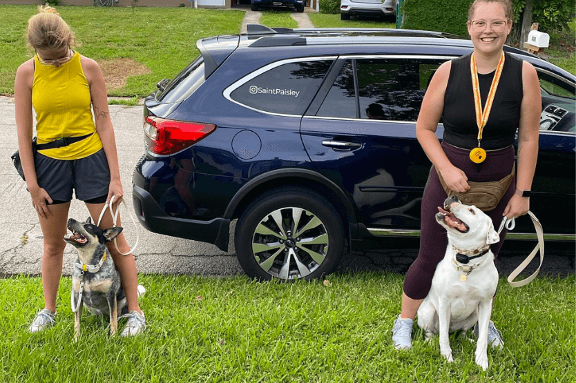 Haley and Scout pose next to their friends Danielle and Paisley, with both dogs in middle position