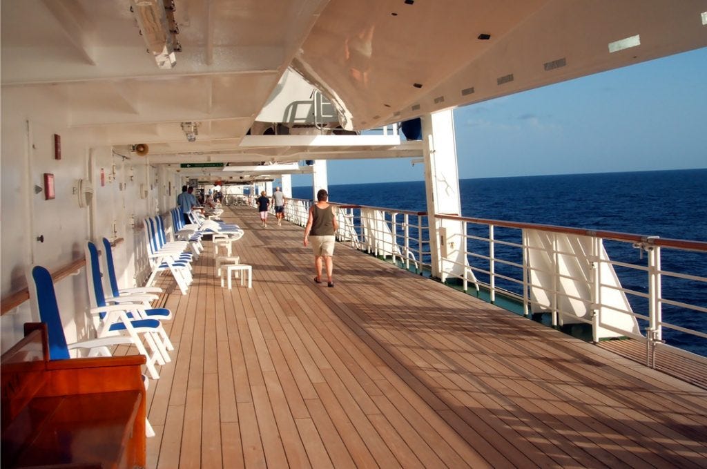 Walking on the promenade deck of a cruise ship