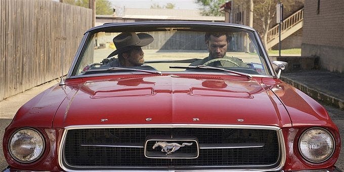 Walker Jared Padalecki with Hoyt in red Ford car.