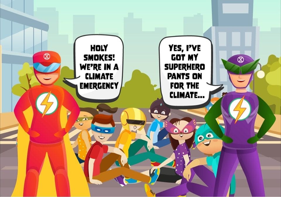 Two cartoon superhero characters. The one on the left says "Holy smokes! we're in a climate emergency" The one of the right replies "Yes I've got my superhero pants on for the climate"