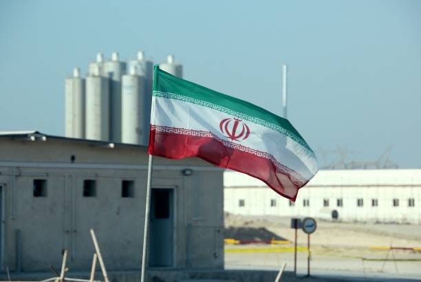 Picture taken on November 10 shows an Iranian flag in Iran's Bushehr nuclear power plant, during an official ceremony to kick-start works on a second...