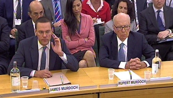 James Murdoch (left) and Rupert Murdoch giving evidence to the Culture, Media and Sport Select Committee in the House of Commons in central London on the News of the World phone-hacking scandal. James Murdoch is to step down as executive chairman of News International to focus on expanding international TV businesses, the company announced today. Issue date: Wednesday February 29, 2012. See PA story CITY Murdoch.