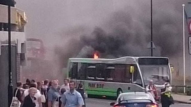 Electric bus catches fire in York city centre - BBC News
