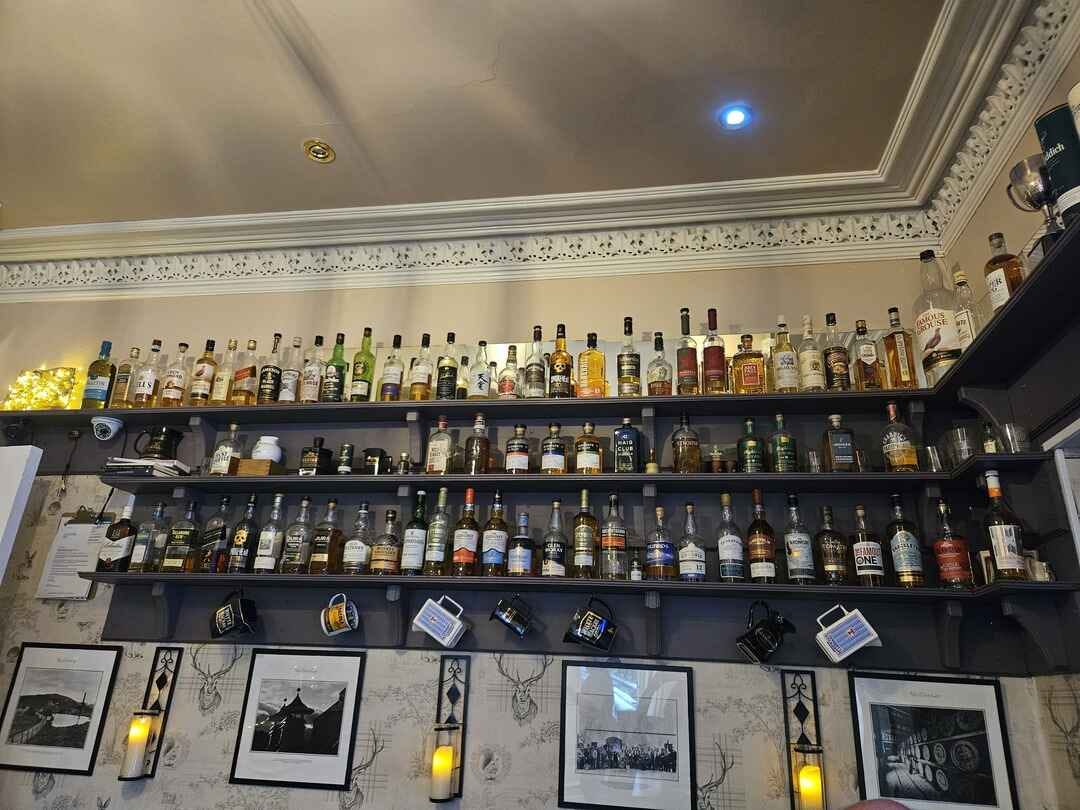 A wall of scotch whiskey for the tasting