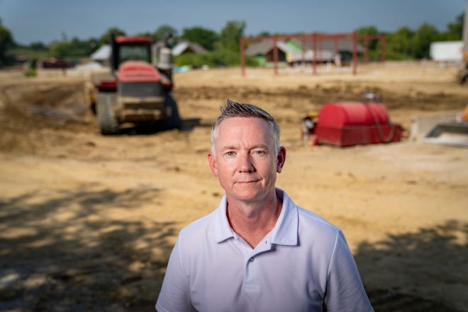 Andrew Allen, president and CEO of YSS, at the Ember Recovery Campus under construction in Cambridge, It's an effort to expand the short supply of mental health treatment facilities for youth in Iowa.