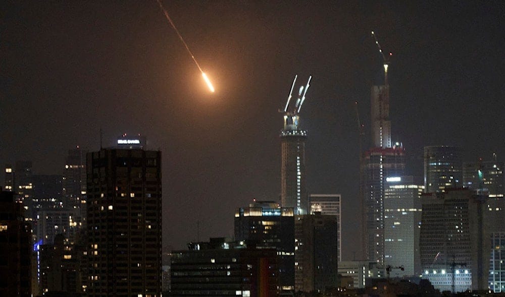 The trace of a projectile is seen before hitting Tel Aviv, occupied Palestine, early Saturday, June 14, 2025. (AP) The trace of a projectile is seen before hitting Tel Aviv, occupied Palestine, early Saturday, June 14, 2025. (AP)