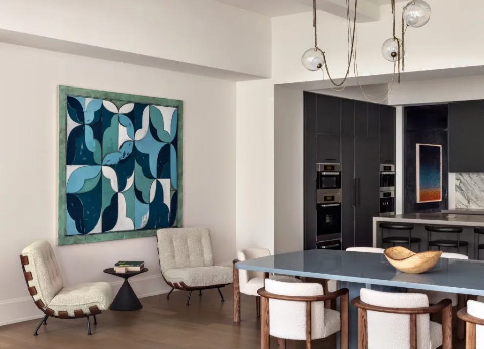 The open living/dining/kitchen area at the Whitman condo in NoMad. Kate Bellin Contemporary