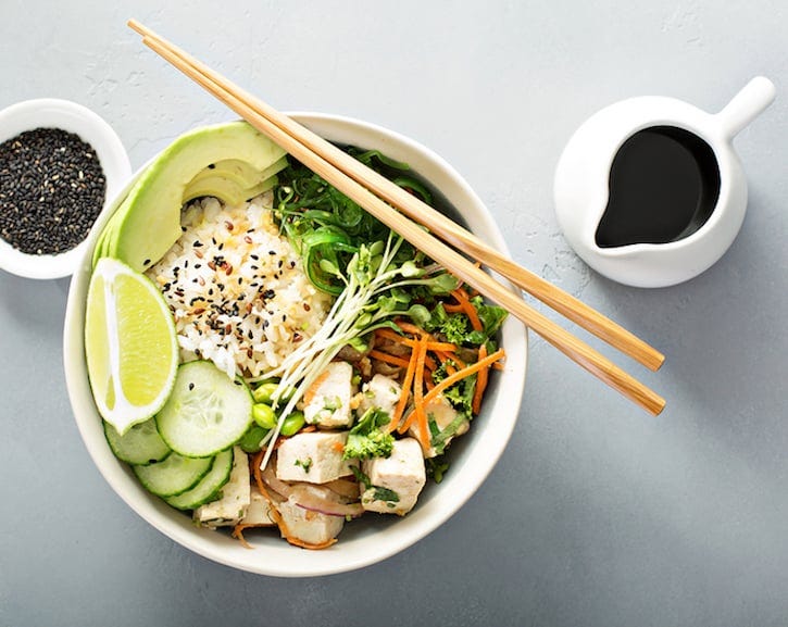 Vegan Poke Bowl with rice, tofu, and vegetables
