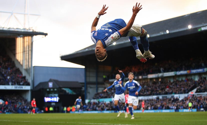 Omari Hutchinson completes a somersault after scoring Ipswich's third goal against Birmingham City (February 2024)