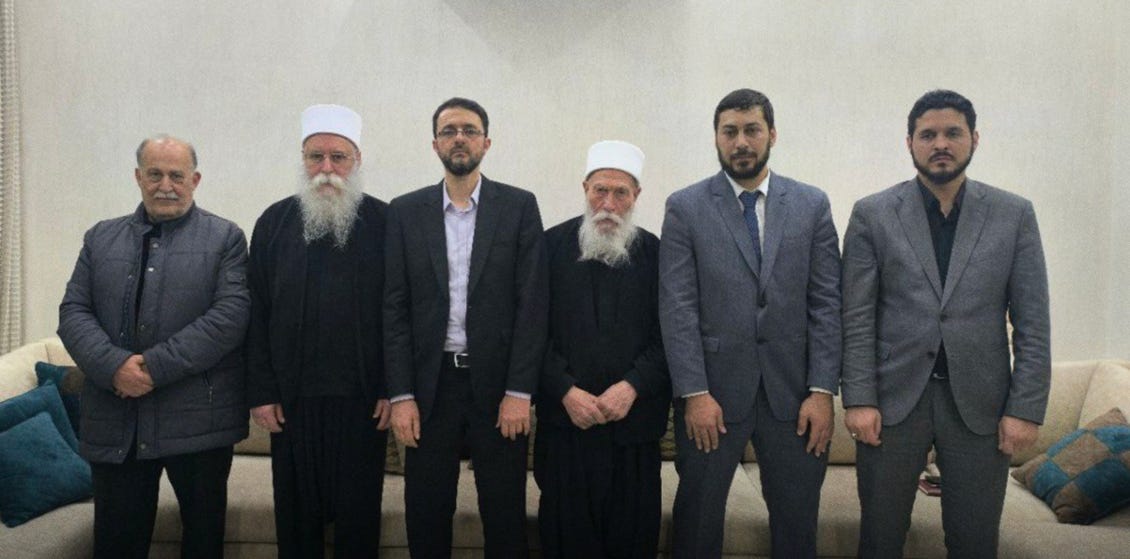 A group of men standing together

AI-generated content may be incorrect.