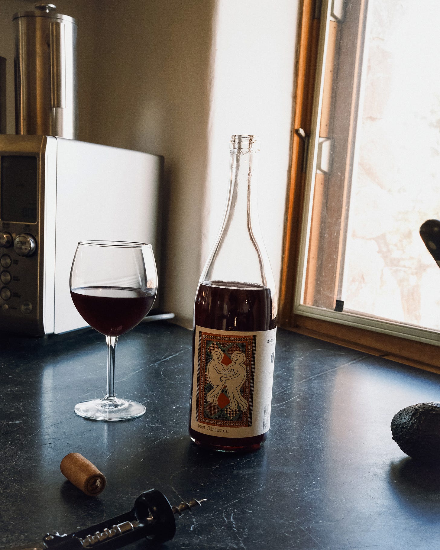 Bottle of open wine on counter