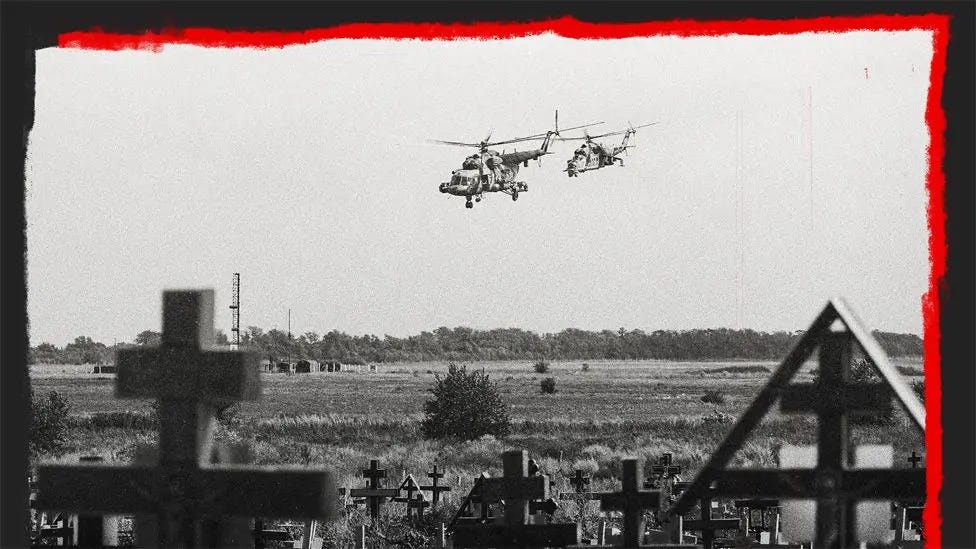 Russian military helicopters flying near a cemetery close to a military airfield outside Taganrog, Rostov in July 2022.