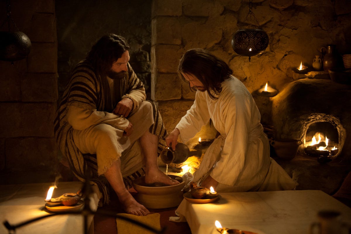Jesus washing a disciple's feet