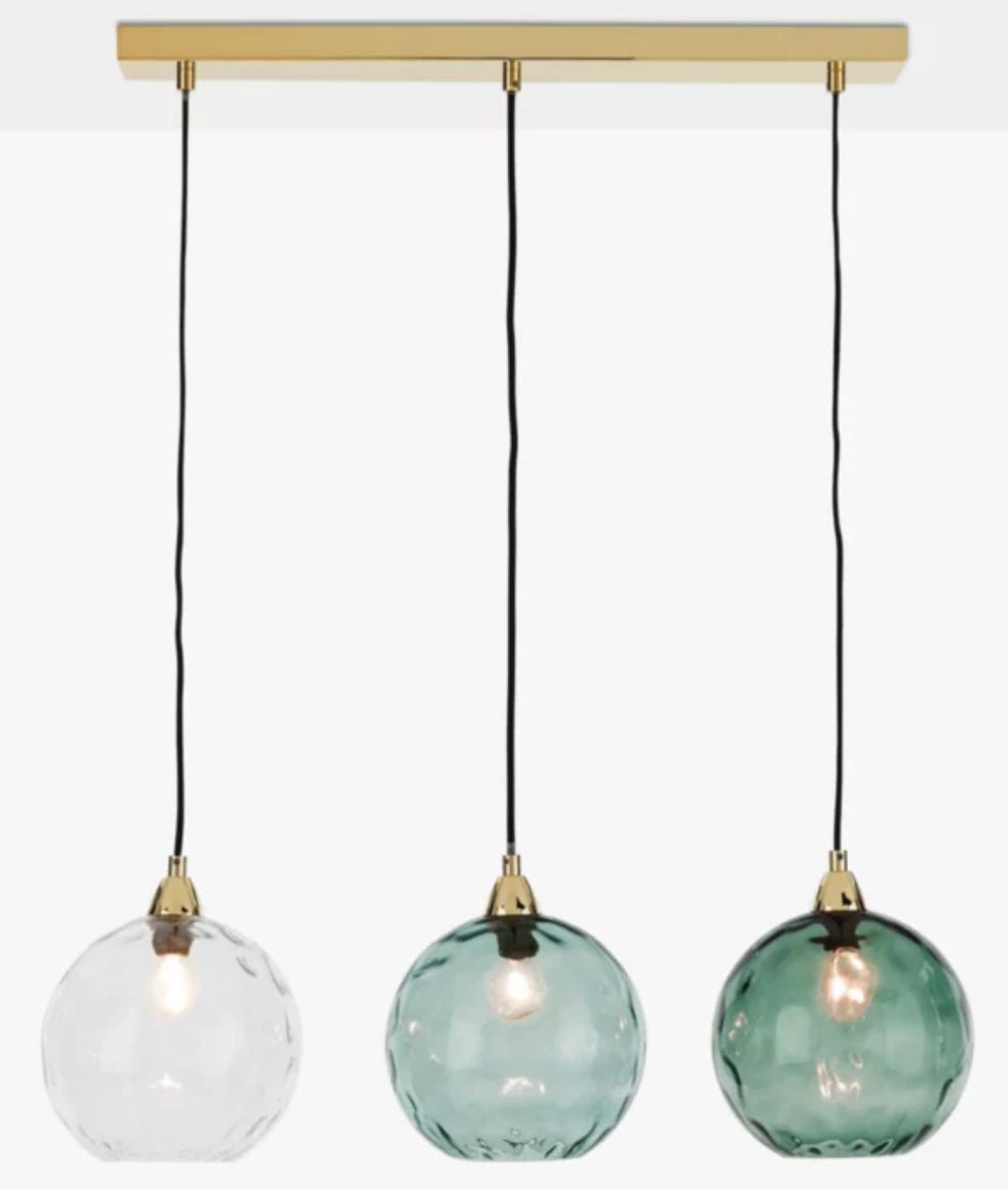 three light pendants in clear glass and two different tones of aqua