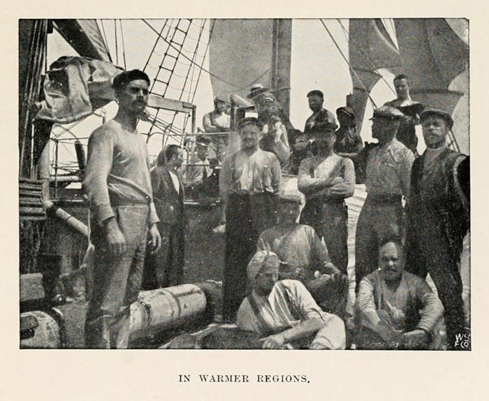 Group of men explorers on an old boat.