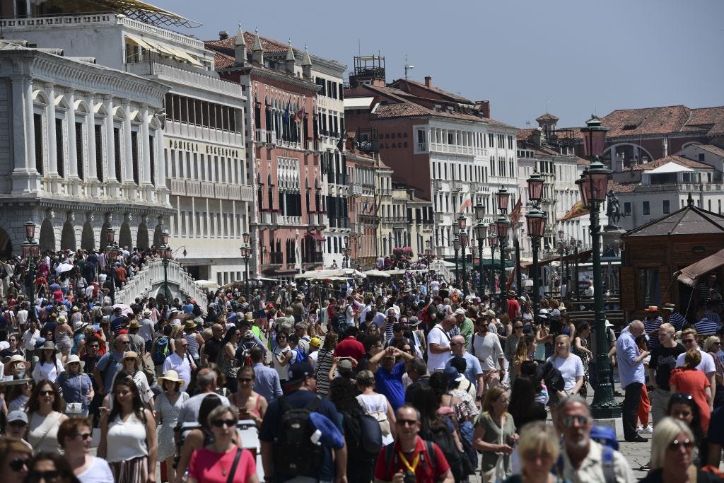 Tourism Is Overwhelming the World's Top Destinations - Bloomberg