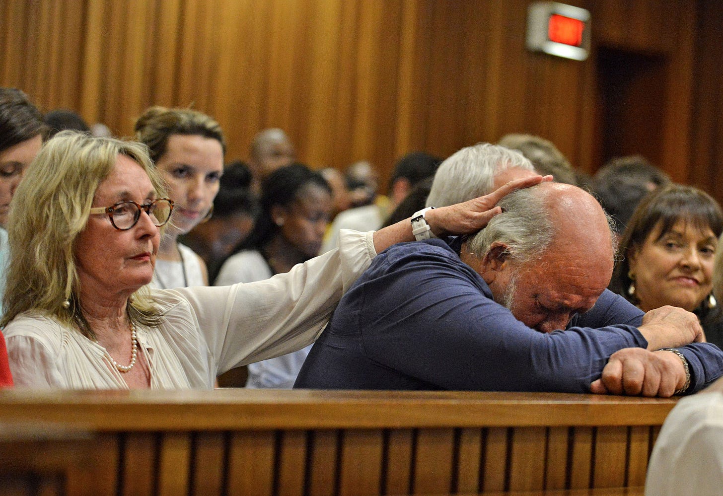 Reeva Steenkamp's mother consoles her husband during the Oscar Pistorius trial
