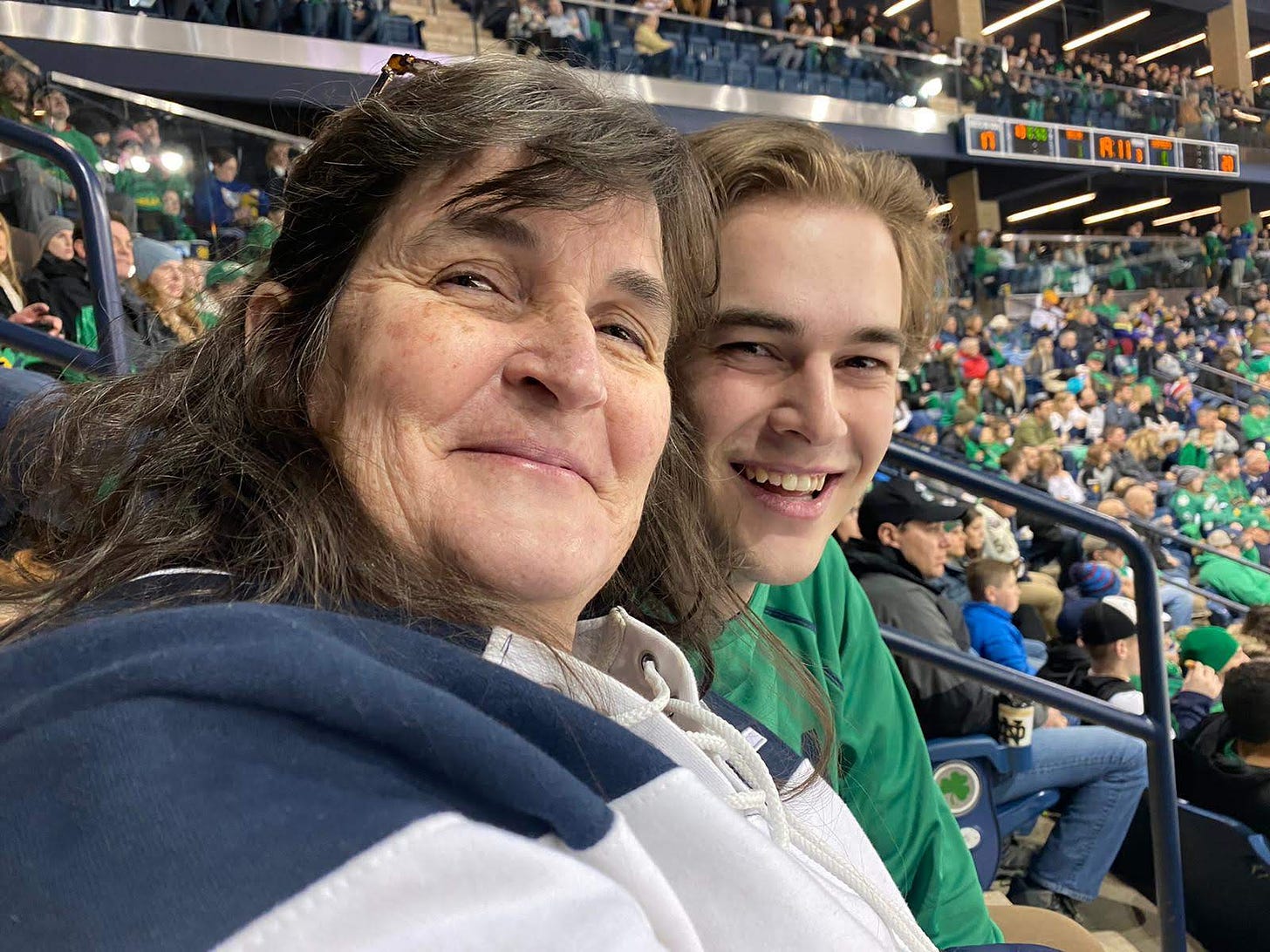 Ben and mom take in a Notre Dame hockey game