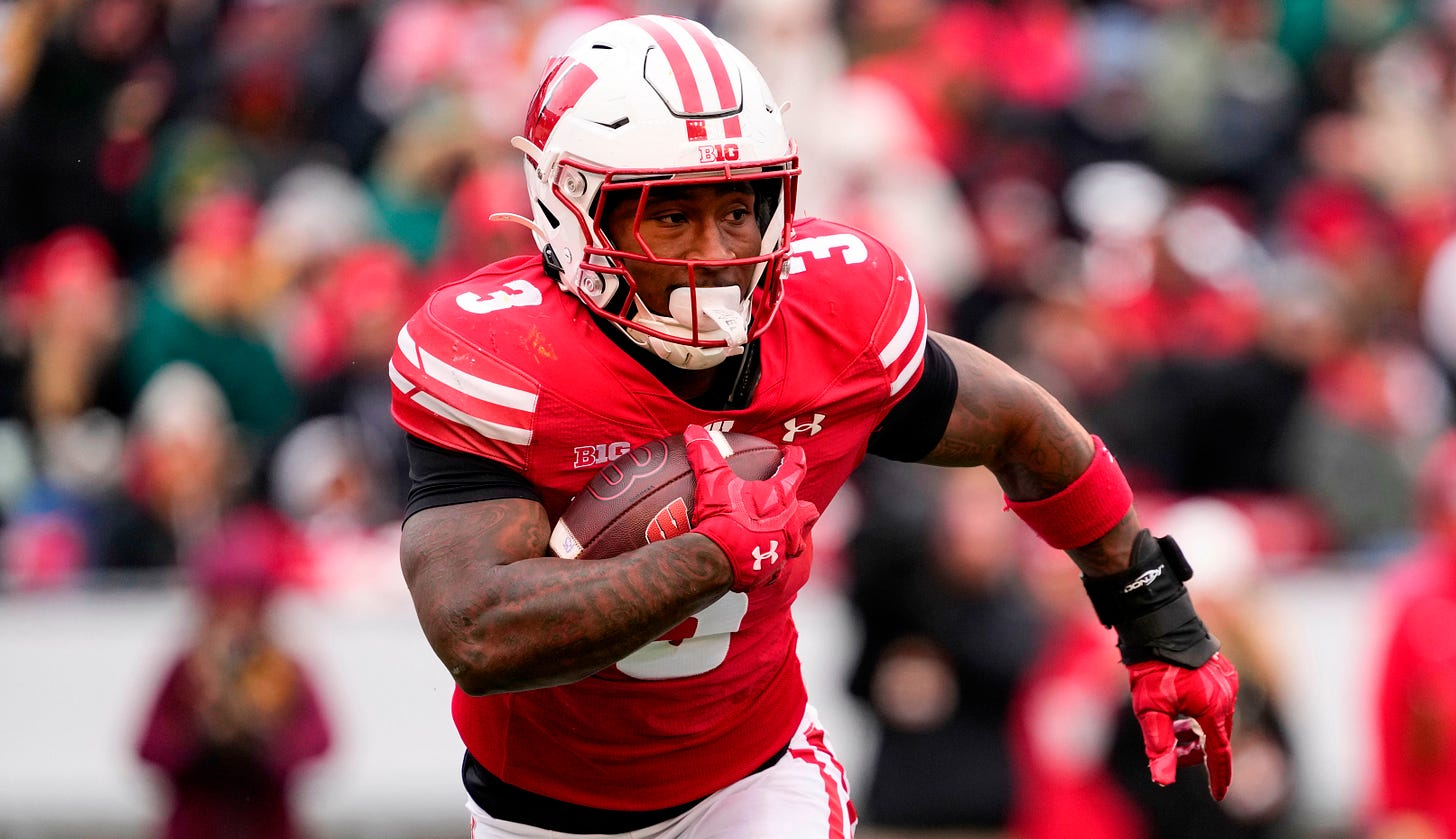 Wisconsin Badgers running back Tawee Walker (3) rushes with the football