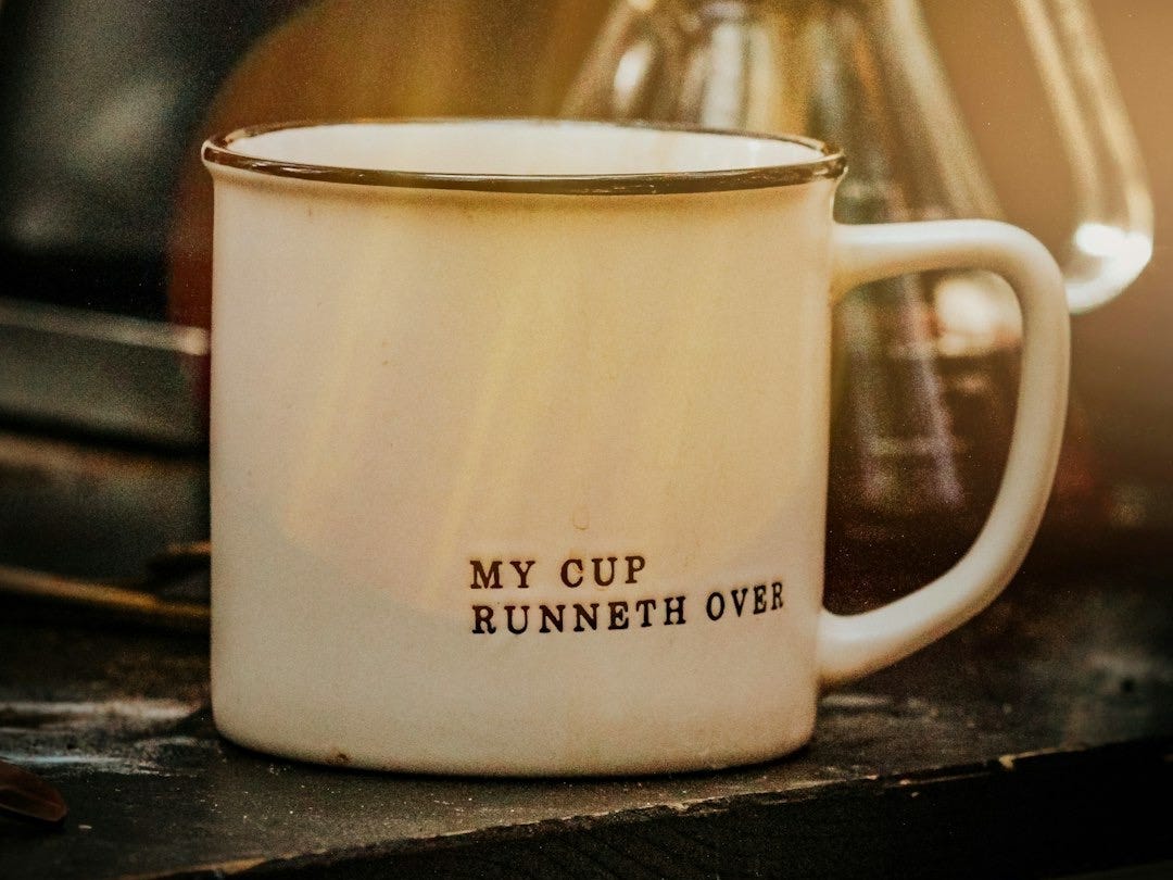 white ceramic mug with coffee