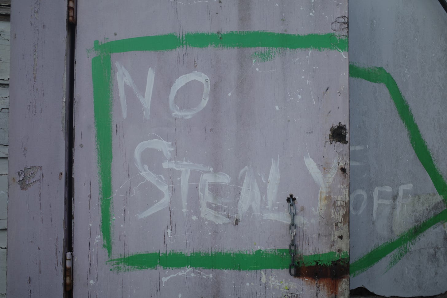 A handpainted sign that says "No stealy F off"
